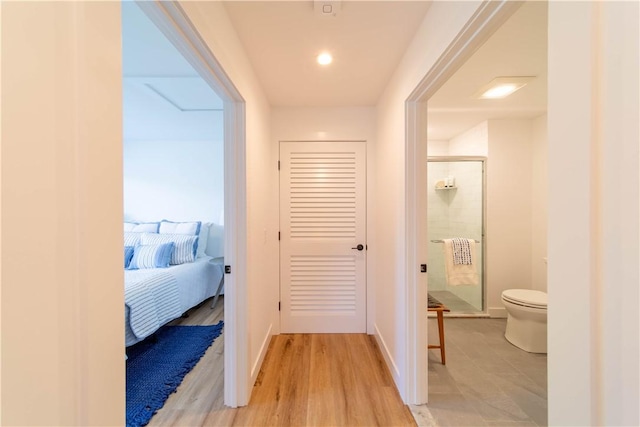 32 Exchange St Unit 101, East Greenwich, RI 02818 - corridor featuring baseboards and light wood-style floors