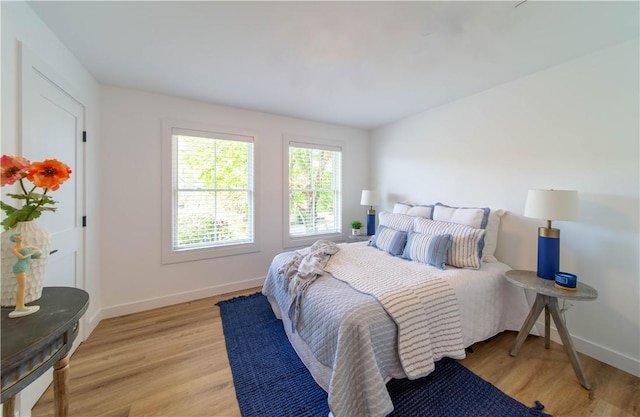 32 Exchange St Unit 101, East Greenwich, RI 02818 - bedroom featuring light wood-style flooring and baseboards