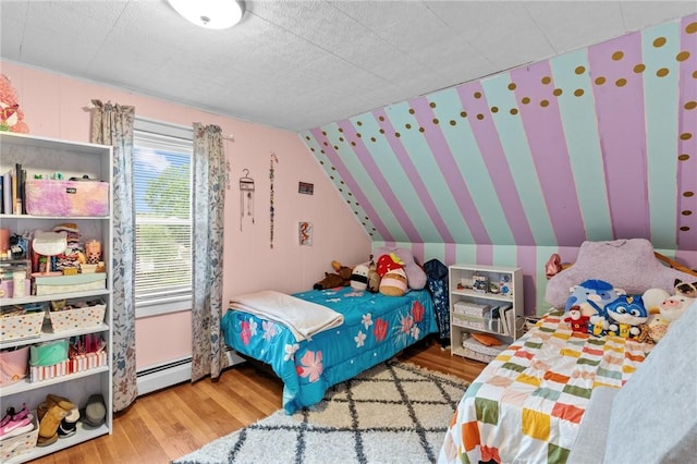 40 Glen St, East Providence, RI 02915 - bedroom with wood finished floors, vaulted ceiling, and baseboard heating