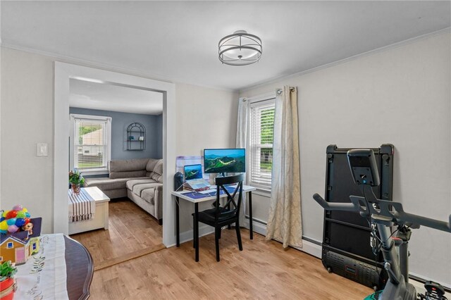 40 Glen St, East Providence, RI 02915 - office area with light wood-type flooring, plenty of natural light, crown molding, and a baseboard radiator