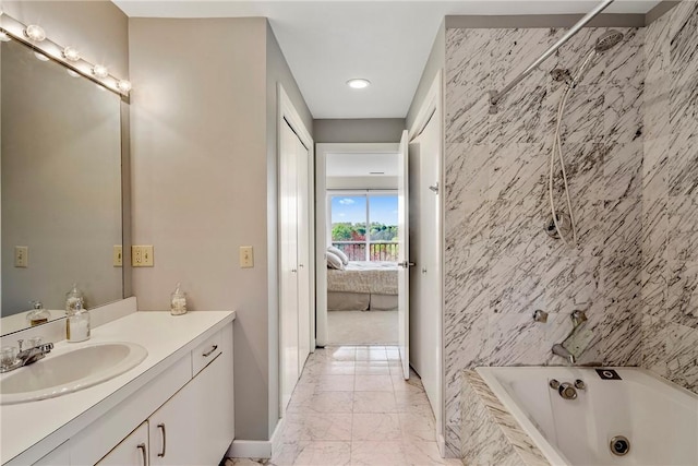 15 Hammersmith Rd Unit 19, Newport, RI 02840 - ensuite bathroom with marble finish flooring, a jetted tub, vanity, a shower, and recessed lighting