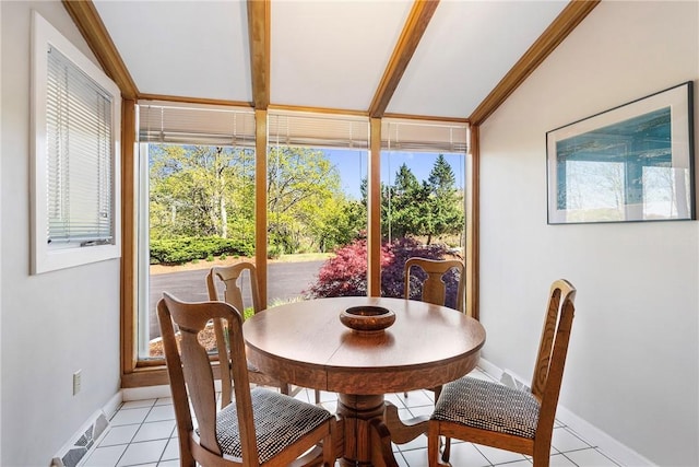 15 Hammersmith Rd Unit 19, Newport, RI 02840 - dining room featuring baseboards, lofted ceiling, and light tile patterned floors