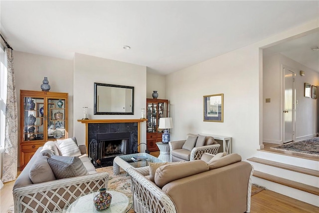 15 Hammersmith Rd Unit 19, Newport, RI 02840 - living room featuring a fireplace and wood finished floors