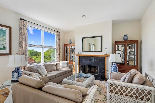 15 Hammersmith Rd Unit 19, Newport, RI 02840 - living area with a tile fireplace and baseboards