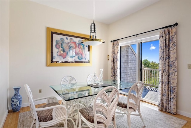 15 Hammersmith Rd Unit 19, Newport, RI 02840 - dining area featuring wood finished floors and baseboards