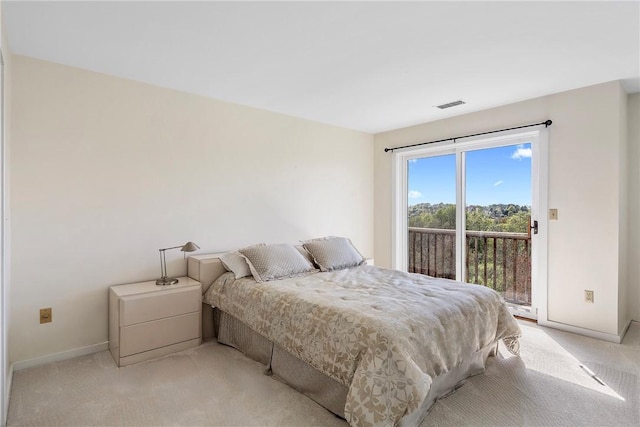 15 Hammersmith Rd Unit 19, Newport, RI 02840 - bedroom featuring access to exterior, light colored carpet, and baseboards