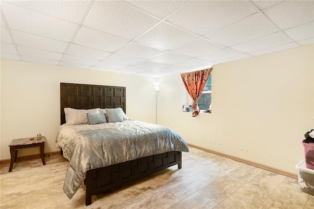 19 S Locust Ave, North Providence, RI 02911 - bedroom featuring a paneled ceiling, baseboards, and light tile patterned floors