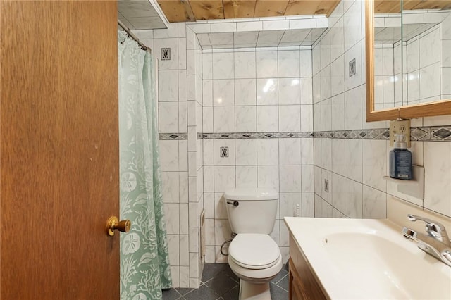 19 S Locust Ave, North Providence, RI 02911 - full bath featuring tile walls, tile patterned floors, toilet, vanity, and a shower with curtain