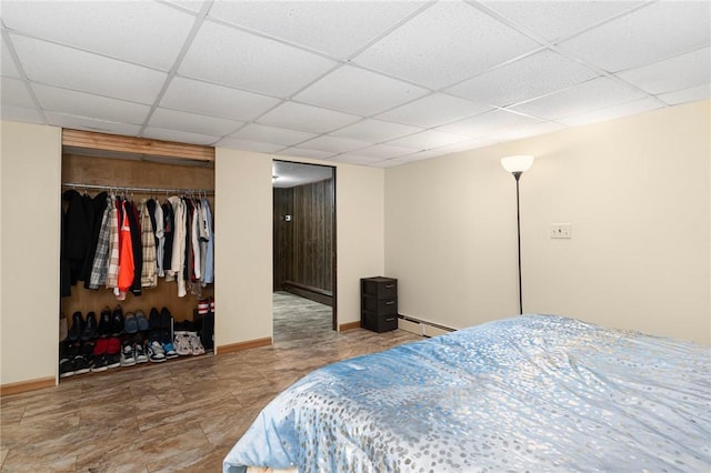 19 S Locust Ave, North Providence, RI 02911 - bedroom with a paneled ceiling, a closet, a baseboard radiator, and baseboards