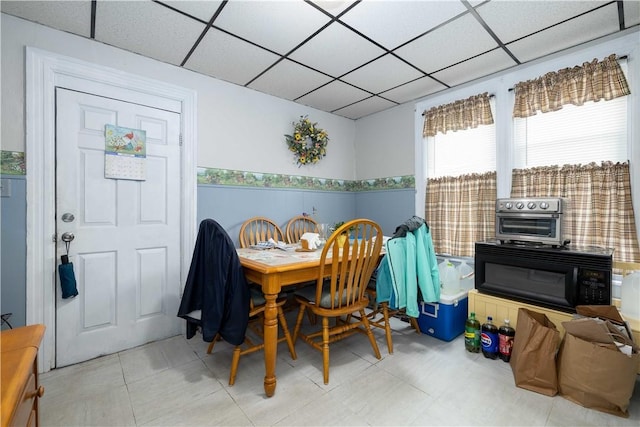 115 Division St, Pawtucket, RI 02860 - dining area with a paneled ceiling and wainscoting