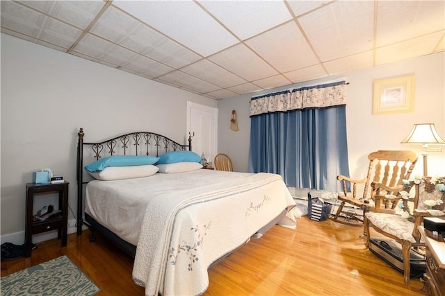 115 Division St, Pawtucket, RI 02860 - bedroom featuring wood finished floors and a drop ceiling