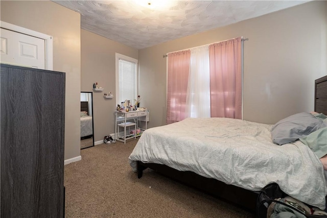 115 Division St, Pawtucket, RI 02860 - bedroom with carpet flooring and baseboards