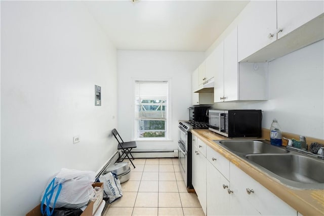115 Division St, Pawtucket, RI 02860 - kitchen featuring a sink, double oven range, white cabinetry, light tile patterned flooring, and a baseboard heating unit