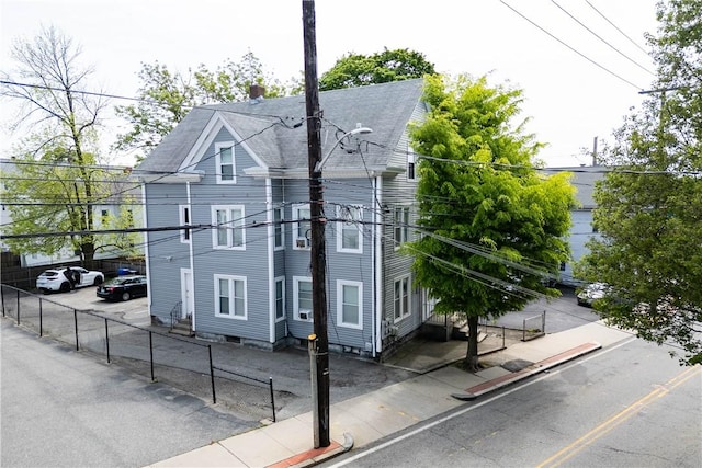 115 Division St, Pawtucket, RI 02860 - view of property exterior with a shingled roof