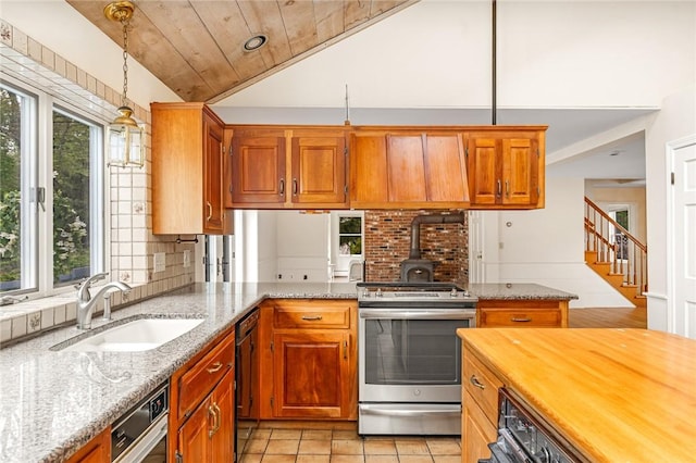 40 Wood Ave, Narragansett, RI 02882 - kitchen with stainless steel electric range oven, a sink, black dishwasher, healthy amount of natural light, and vaulted ceiling