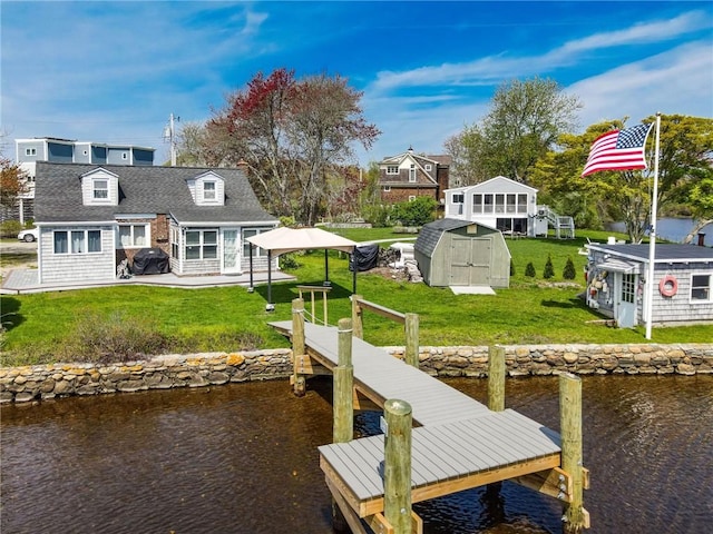 108 Sand Piper Dr, South Kingstown, RI 02879 - dock featuring a water view, a yard, and a patio