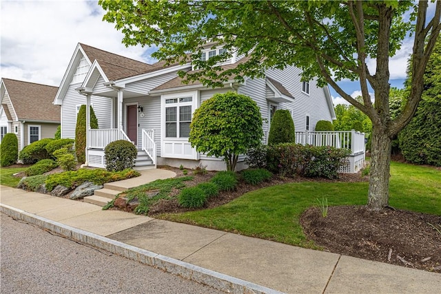 500 Mendon Rd Unit 116, Cumberland, RI 02864 - view of front of house featuring a front lawn and roof with shingles
