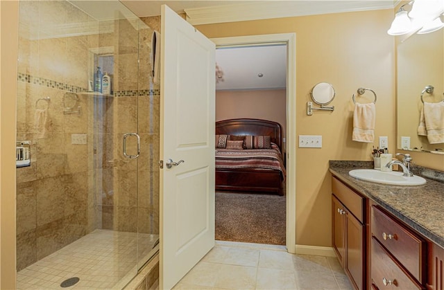 500 Mendon Rd Unit 116, Cumberland, RI 02864 - ensuite bathroom with vanity, a shower stall, tile patterned flooring, and crown molding