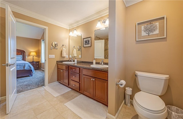 500 Mendon Rd Unit 116, Cumberland, RI 02864 - bathroom featuring connected bathroom, double vanity, crown molding, and tile patterned flooring