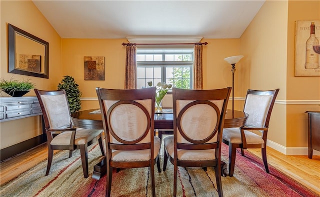 500 Mendon Rd Unit 116, Cumberland, RI 02864 - dining room with light wood finished floors and lofted ceiling