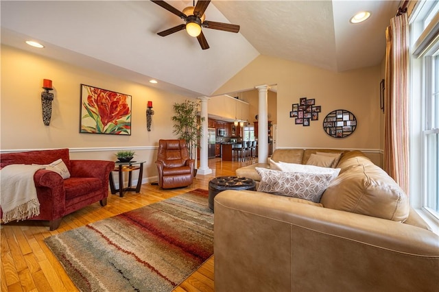 500 Mendon Rd Unit 116, Cumberland, RI 02864 - living room featuring decorative columns, ceiling fan, plenty of natural light, vaulted ceiling, and wood finished floors