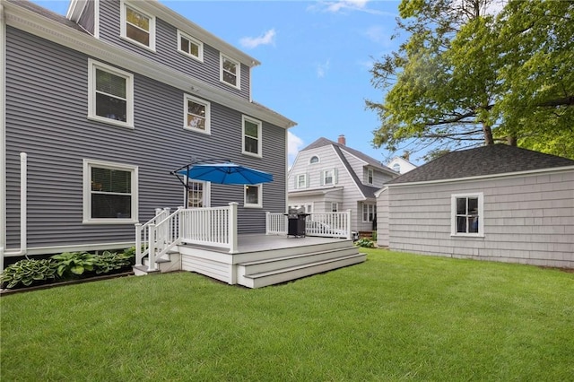 224 Raleigh Ave, Pawtucket, RI 02860 - rear view of house featuring a lawn and a deck