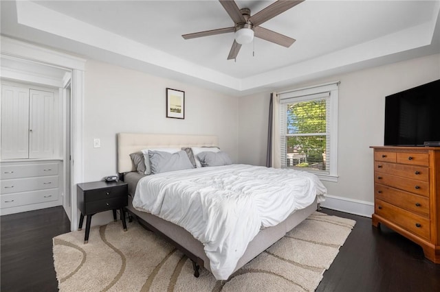 224 Raleigh Ave, Pawtucket, RI 02860 - bedroom featuring dark wood-style floors, a raised ceiling, baseboards, and a ceiling fan