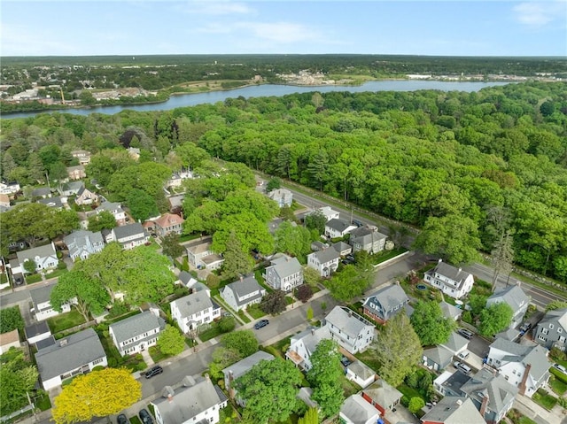 224 Raleigh Ave, Pawtucket, RI 02860 - aerial view of residential area with a nearby body of water and a forest
