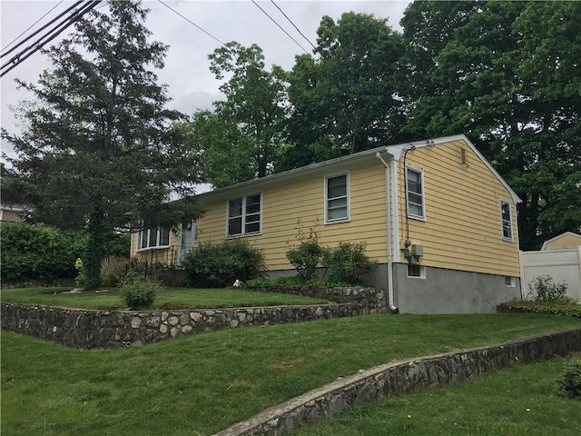 17 Woodcliff Ave, North Providence, RI 02911 - view of side of property featuring a lawn