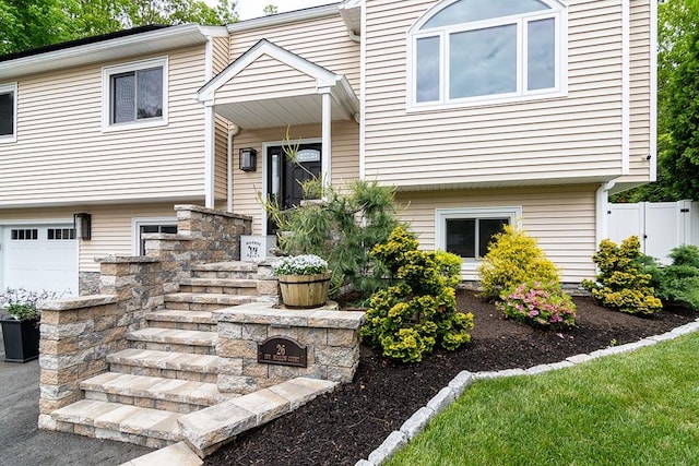 26 Ivy Hollow Ct, Cranston, RI 02921 - view of front of home featuring an attached garage