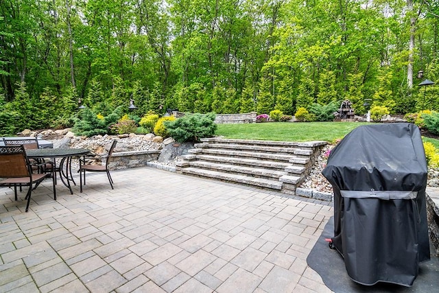 26 Ivy Hollow Ct, Cranston, RI 02921 - view of patio with outdoor dining space, a grill, and a wooded view