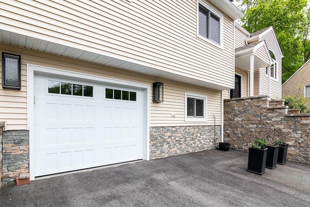 26 Ivy Hollow Ct, Cranston, RI 02921 - garage with asphalt driveway