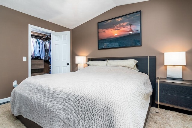 26 Ivy Hollow Ct, Cranston, RI 02921 - bedroom featuring carpet, vaulted ceiling, a walk in closet, baseboards, and a closet