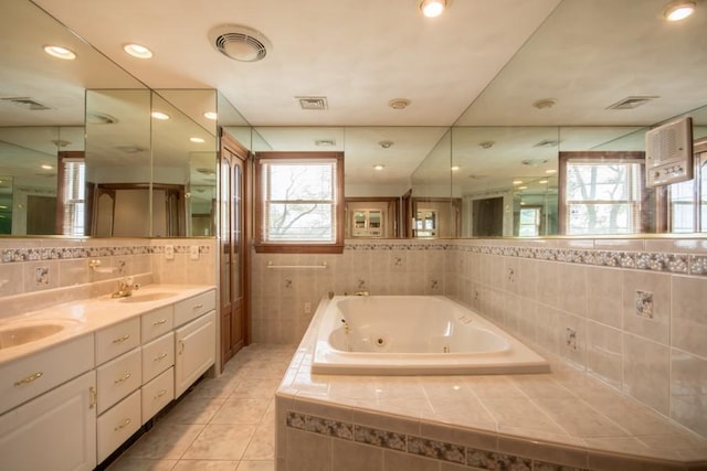 3622 Main Rd, Tiverton, RI 02878 - bathroom featuring tile walls, a jetted tub, tile patterned floors, and double vanity