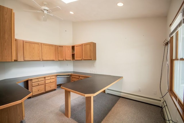 3622 Main Rd, Tiverton, RI 02878 - kitchen with baseboard heating, a ceiling fan, dark countertops, recessed lighting, and a peninsula