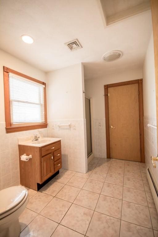 3622 Main Rd, Tiverton, RI 02878 - bathroom with tile walls, tile patterned flooring, a shower stall, toilet, and vanity