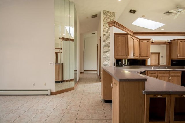 3622 Main Rd, Tiverton, RI 02878 - kitchen featuring a baseboard radiator, a skylight, light tile patterned flooring, vaulted ceiling, and a sink