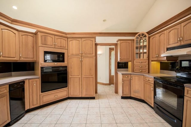 3622 Main Rd, Tiverton, RI 02878 - kitchen with black appliances, under cabinet range hood, light tile patterned floors, backsplash, and glass insert cabinets