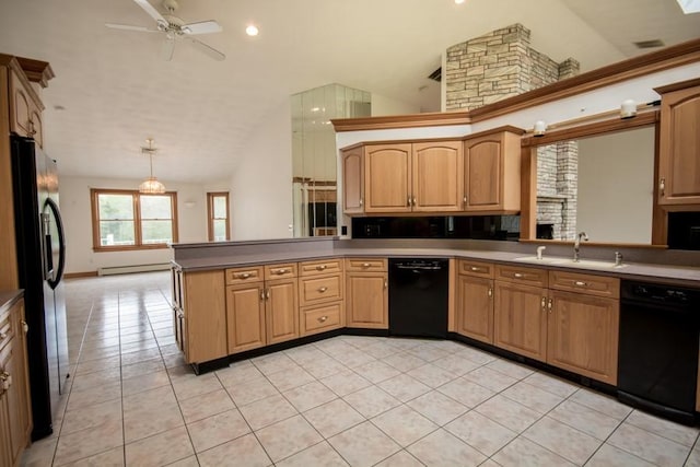 3622 Main Rd, Tiverton, RI 02878 - kitchen featuring lofted ceiling, black appliances, a sink, a peninsula, and a baseboard radiator