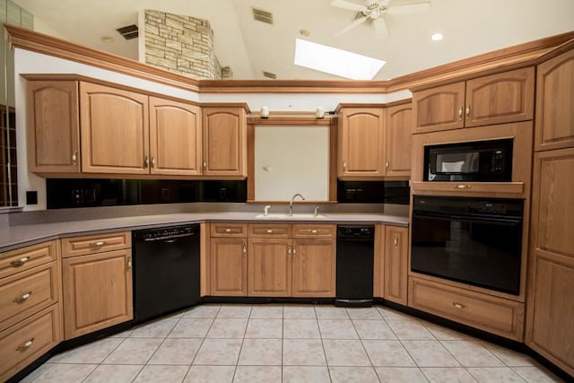 3622 Main Rd, Tiverton, RI 02878 - kitchen featuring black appliances, a sink, a skylight, a ceiling fan, and light tile patterned floors