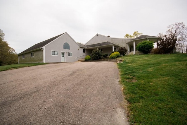 3622 Main Rd, Tiverton, RI 02878 - ranch-style house with asphalt driveway and a front lawn