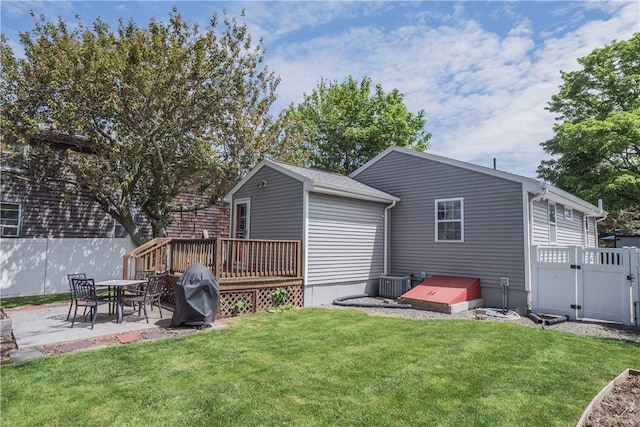 24 Southmayd St, Newport, RI 02840 - rear view of property with a gate, a deck, central air condition unit, and a patio area