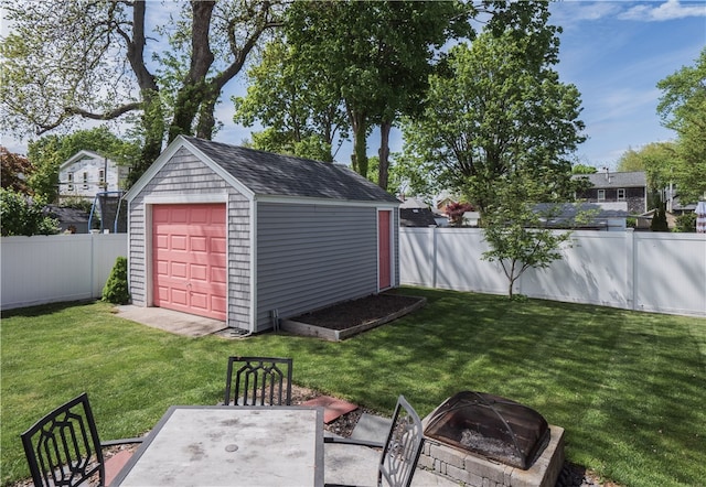 24 Southmayd St, Newport, RI 02840 - view of yard featuring a fire pit and a detached garage