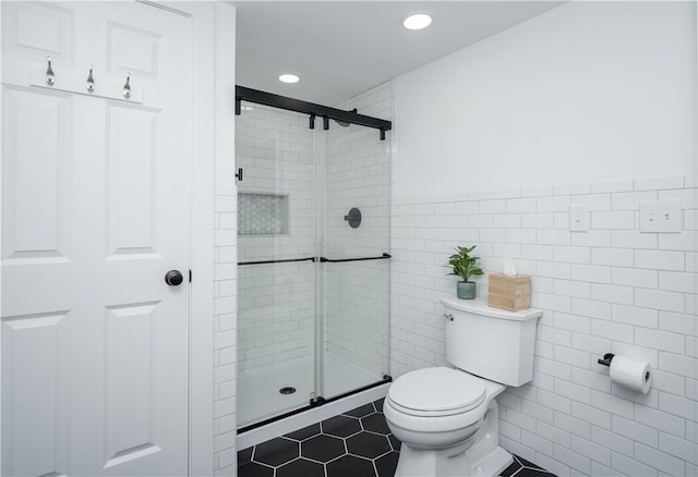 24 Southmayd St, Newport, RI 02840 - full bathroom featuring tile patterned flooring, a stall shower, toilet, tile walls, and recessed lighting
