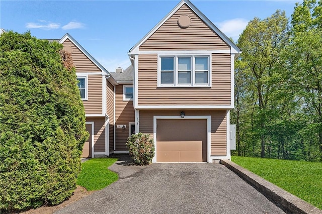 607 Brookhaven Ln, Woonsocket, RI 02895 - view of front facade featuring asphalt driveway and an attached garage