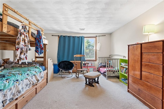 607 Brookhaven Ln, Woonsocket, RI 02895 - carpeted bedroom featuring a textured ceiling