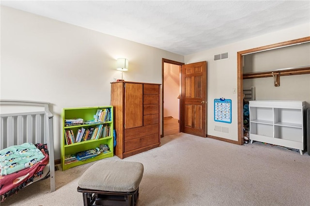 607 Brookhaven Ln, Woonsocket, RI 02895 - bedroom with carpet floors and a closet