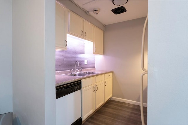 76 Park St Unit C1, Pawtucket, RI 02860 - kitchen featuring dishwasher, a sink, dark wood-type flooring, baseboards, and white cabinetry