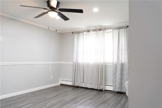 76 Park St Unit C1, Pawtucket, RI 02860 - unfurnished room featuring crown molding, wood finished floors, a ceiling fan, baseboards, and a baseboard radiator