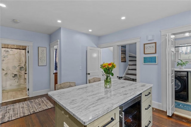 261 Columbus Ave, Pawtucket, RI 02861 - kitchen with wine cooler, washer / dryer, dark wood finished floors, baseboards, and recessed lighting